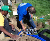 San Jose sprinkler repair technicians Instaling a valve box