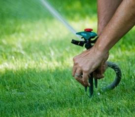 San Jose sprinkler repair technician installs a new head